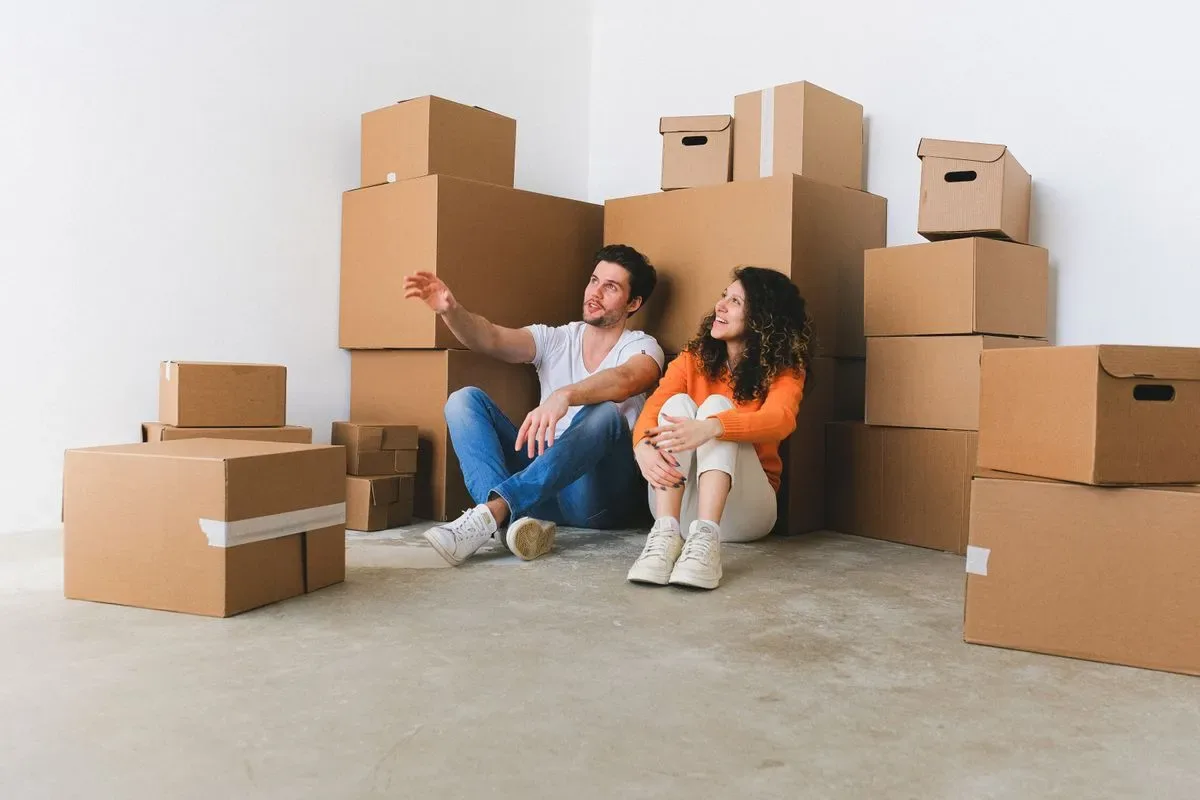 Household items and cardboard boxes gathered together before a home clear-out in Dubai.